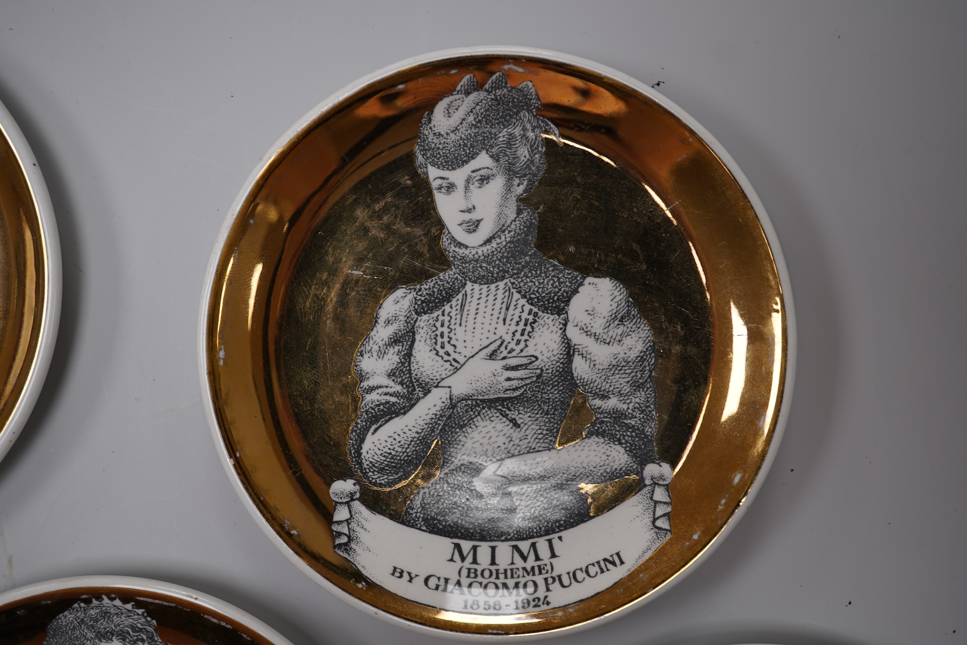Fornasetti, a group of five operatic coasters, ‘Melodramma’ to include Otello and Desdemona, 10cm in diameter